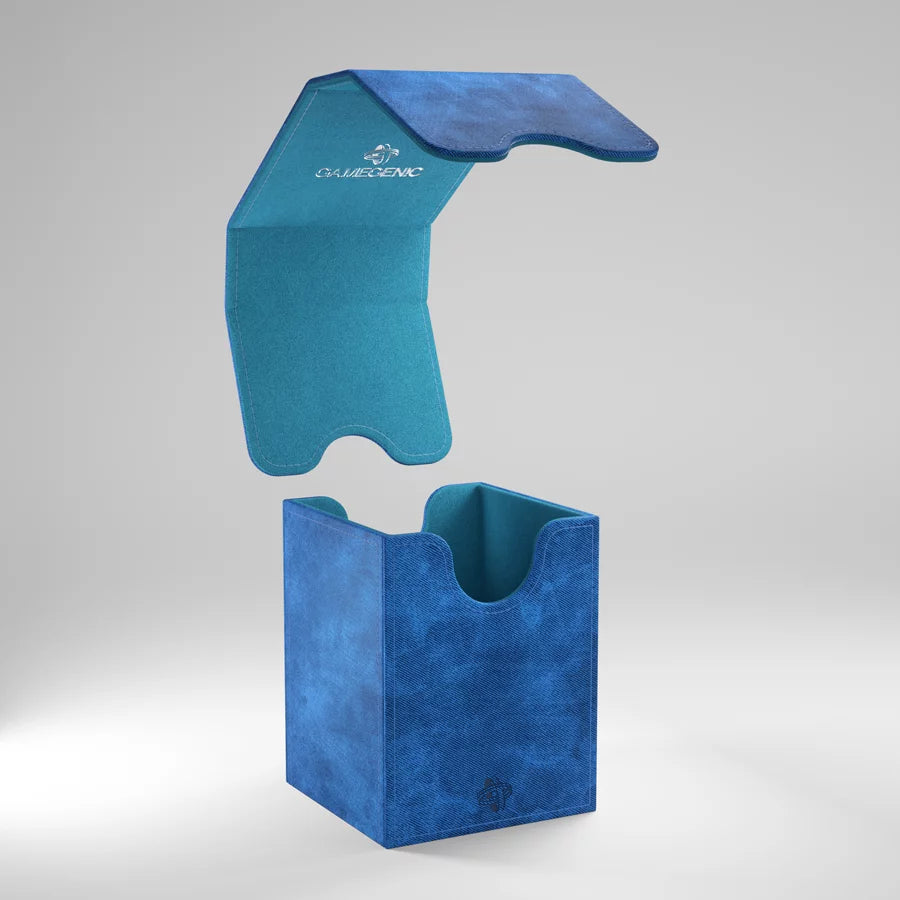 A photo of a blue, fabric box on a white background, with the lid floating in midair above the box.